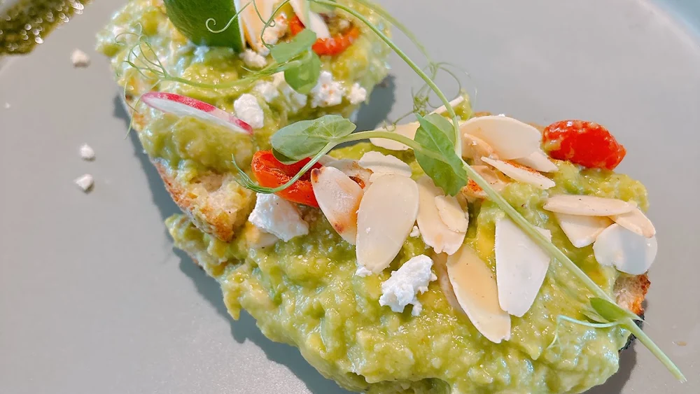 Avocado toast with feta, radish and almonds at Benih Cafe, Kuta, Bali