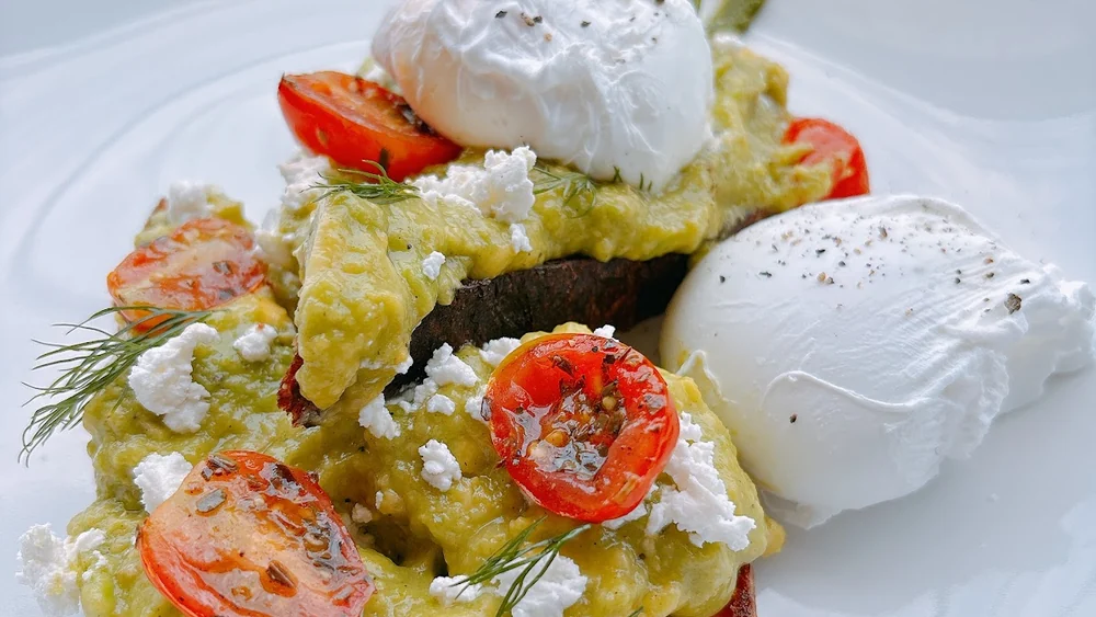 Avocado toast with poached eggs and feta at Crumb and Coaster, Kuta Bali