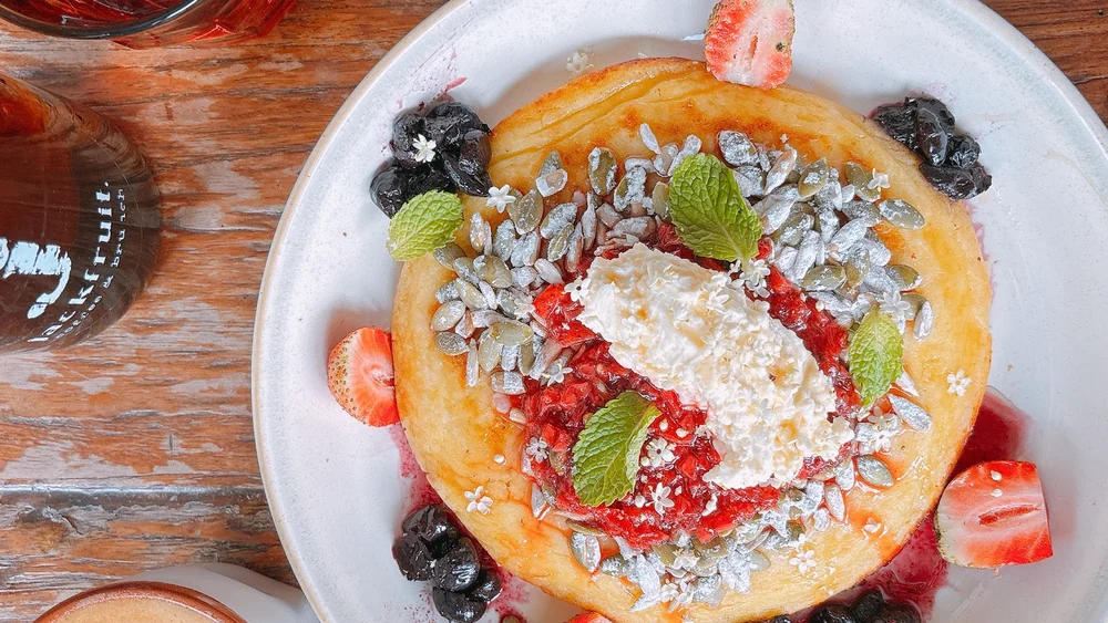 A berry pancake with whipped cream at Jackfruit Coffee and Brunch, Kuta, Bali