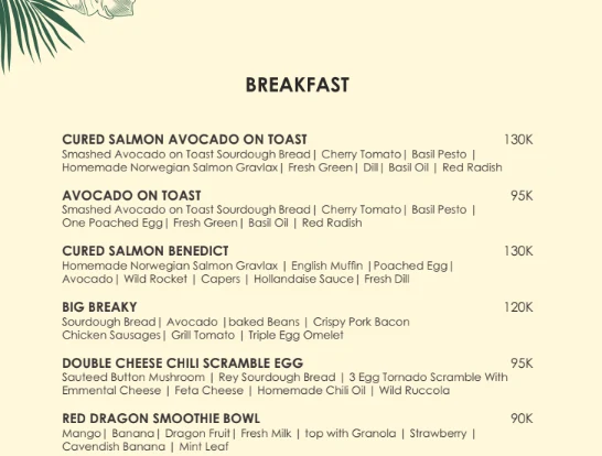 A page of the TIS Cafe Ubud menu showing breakfast dishes and prices — tap to open the full menu